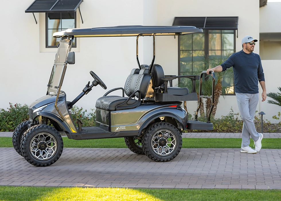 Man with a brand new club car from WVGC